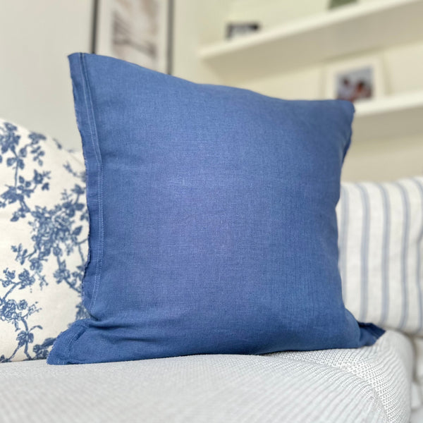 navy blue square cushion with a weathered edge