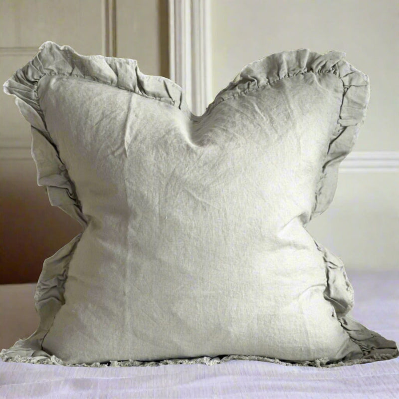 ruffled edge square linen cushion in a sage green colour