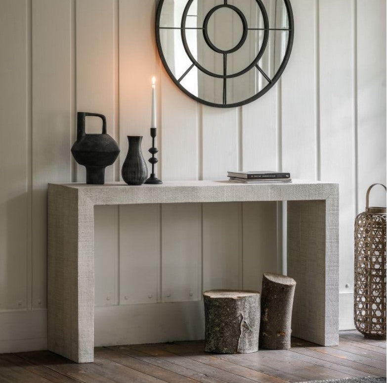 White wash console table on a white wall