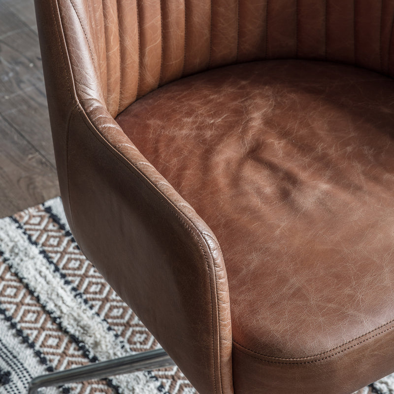 Brown Ribbed Swivel Chair