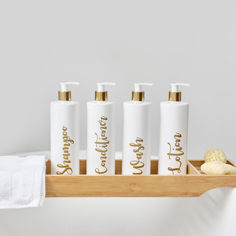 Four 500ml white and gold reusable dispenser pump bottles with custom personalised gold wording, for Shampoo, Conditioner, Wash and Lotion