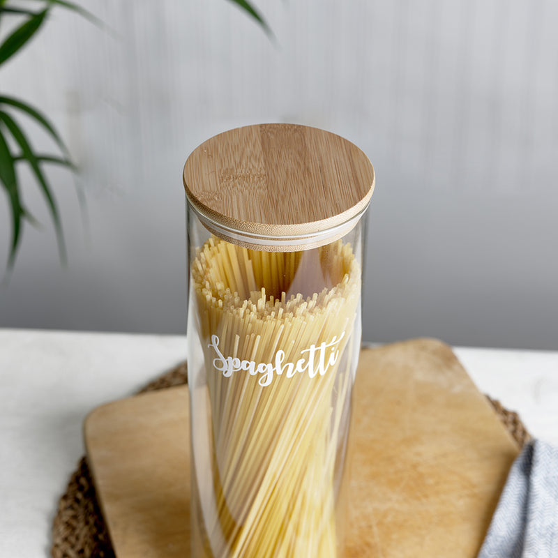  A tall, labelled glass jar with bamboo airtight lids and custom personalised wording for Spaghetti