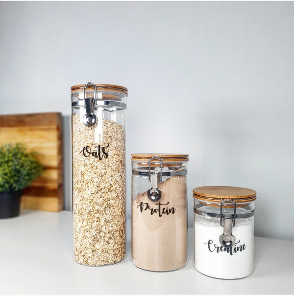 Three glass jars with custom personalised wording for labelling, showing all three sizes.
